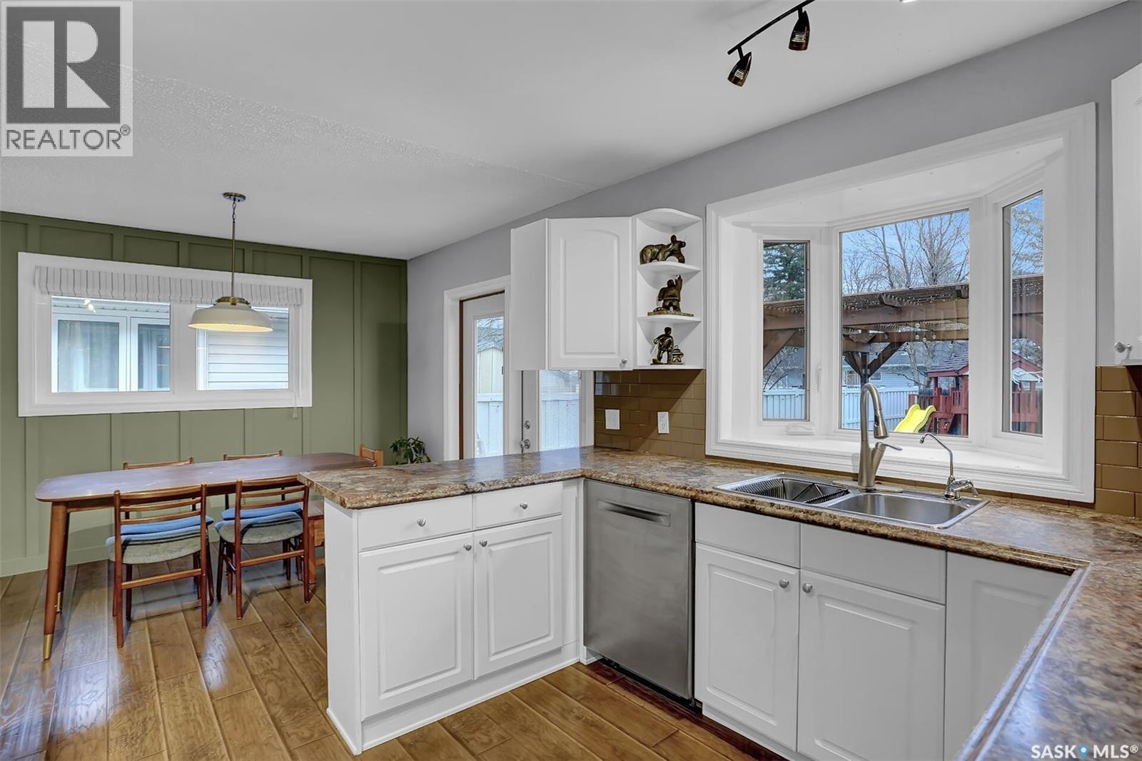 25 Haultain Crescent, Regina, SK - Indoor Photo Showing Kitchen With Double Sink