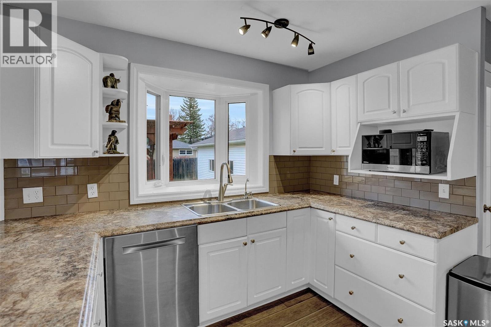 25 Haultain Crescent, Regina, SK - Indoor Photo Showing Kitchen With Double Sink