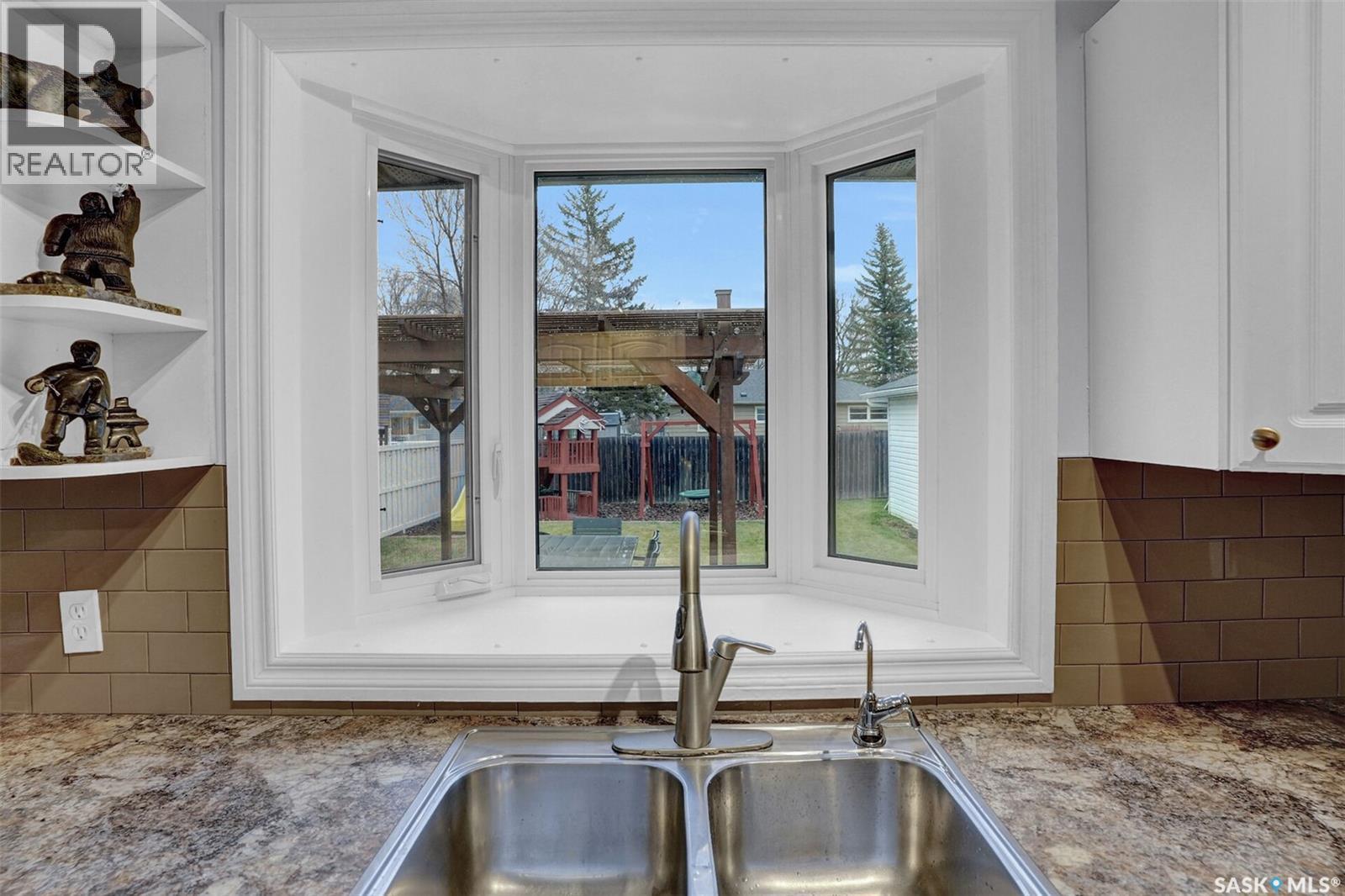 25 Haultain Crescent, Regina, SK - Indoor Photo Showing Kitchen With Double Sink