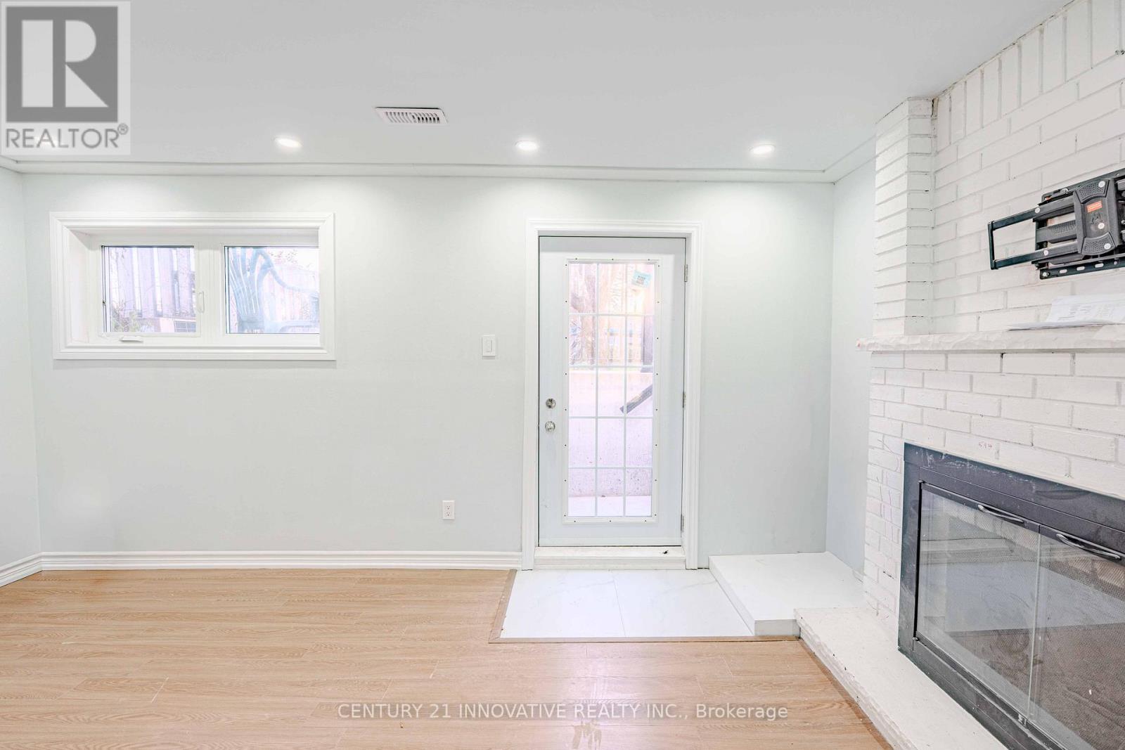 Bsmt - 56 Foxacre Row, Brampton, ON - Indoor Photo Showing Other Room With Fireplace