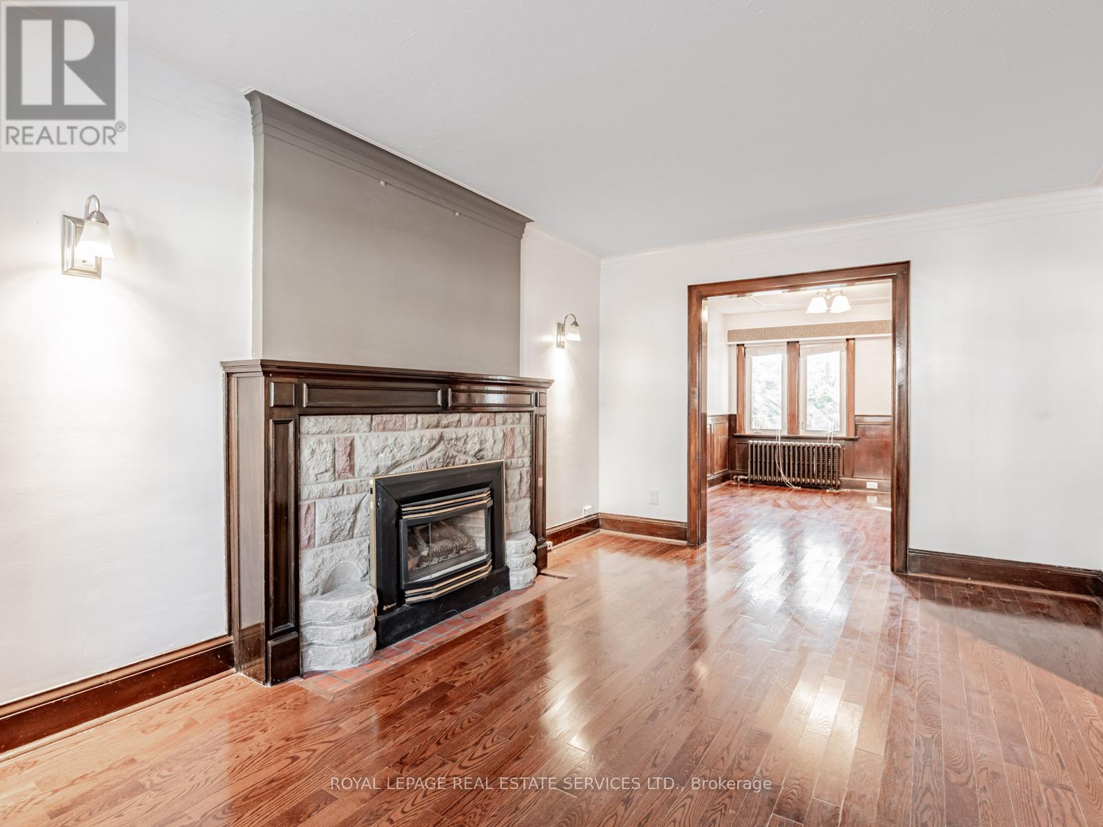 7 Duplex Crescent, Toronto, ON - Indoor Photo Showing Living Room With Fireplace