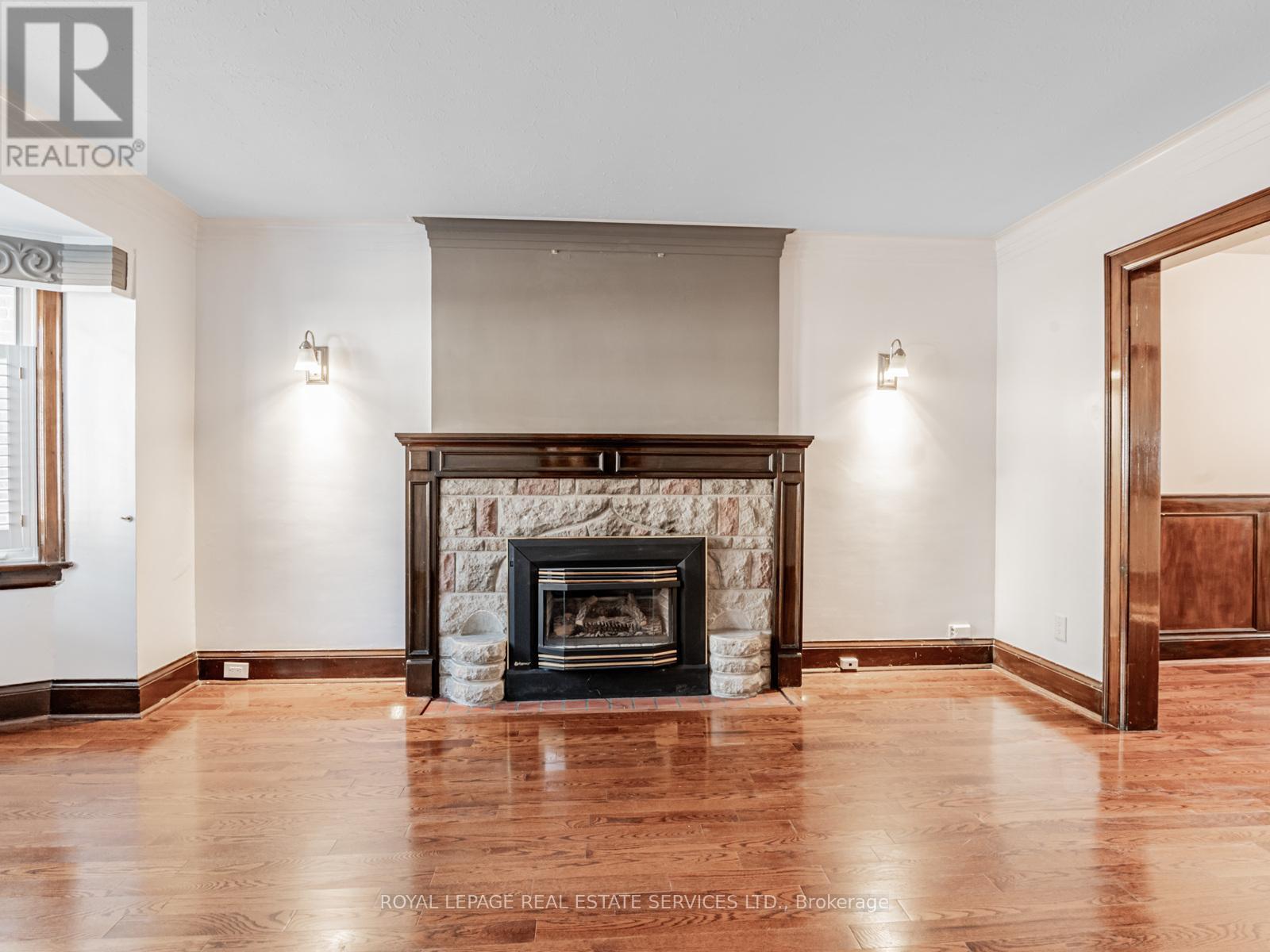7 Duplex Crescent, Toronto, ON - Indoor Photo Showing Living Room With Fireplace