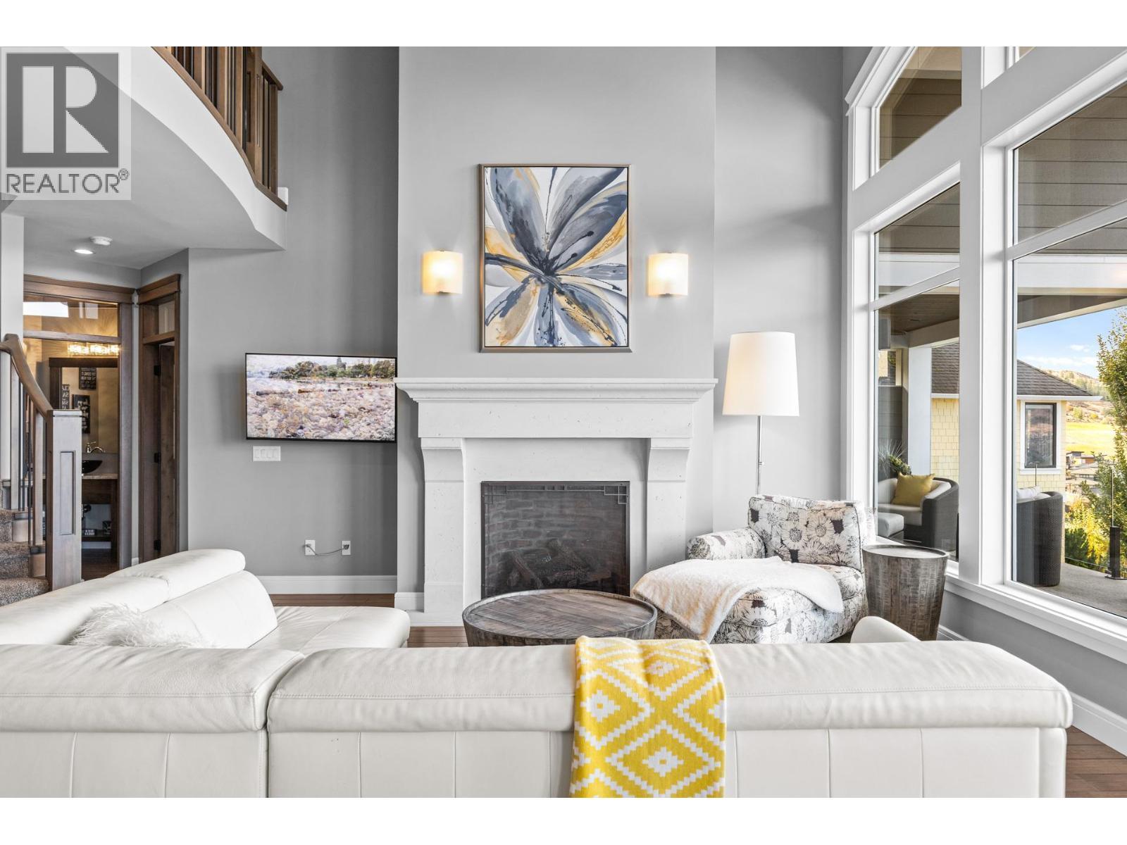 388 Rindle Court, Kelowna, BC - Indoor Photo Showing Living Room With Fireplace