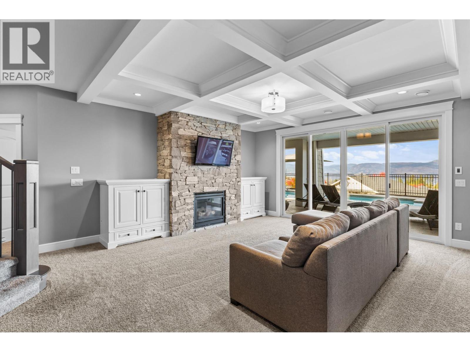 388 Rindle Court, Kelowna, BC - Indoor Photo Showing Living Room With Fireplace