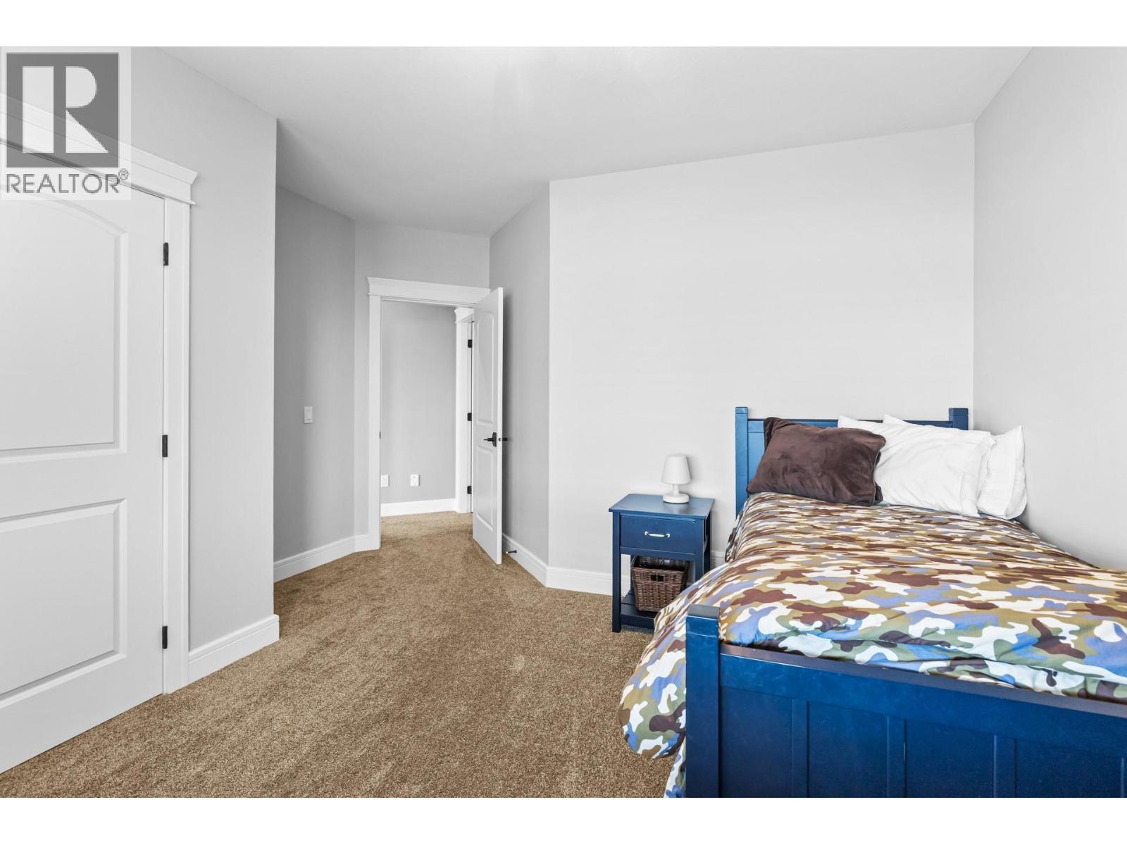 388 Rindle Court, Kelowna, BC - Indoor Photo Showing Bedroom