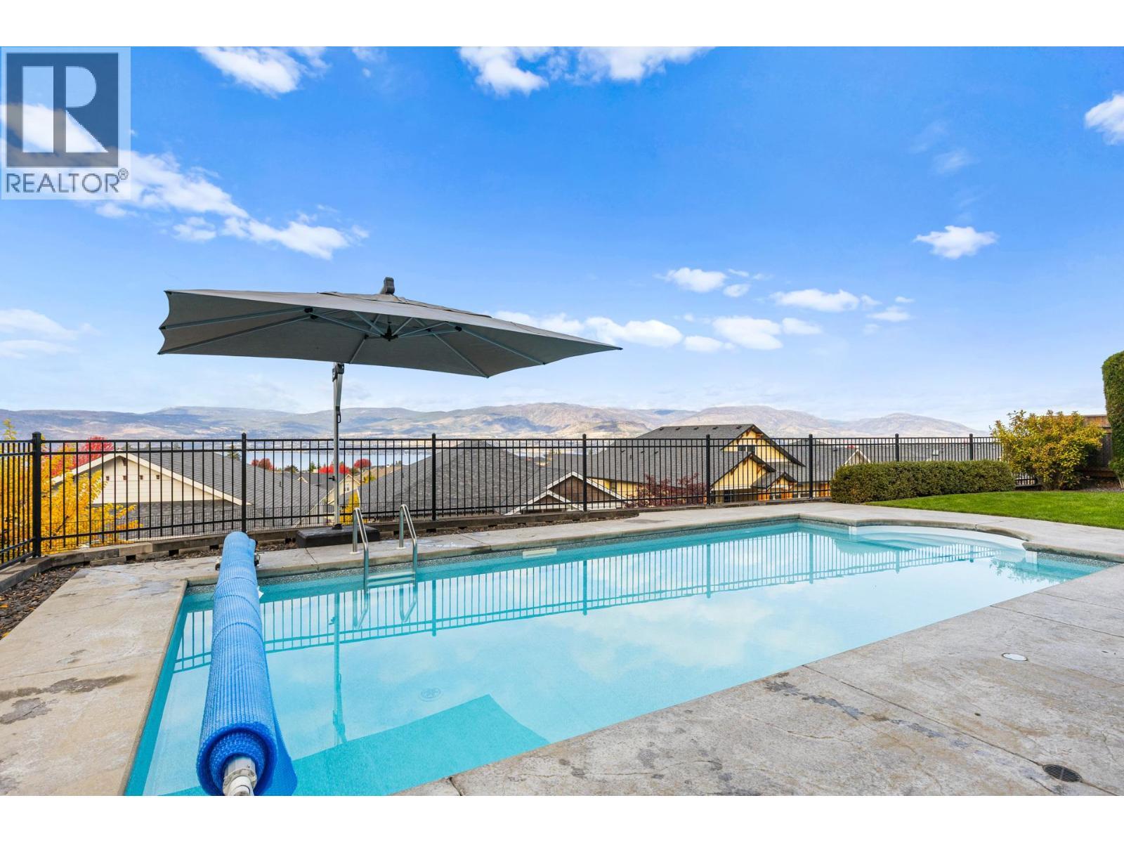 388 Rindle Court, Kelowna, BC - Outdoor With In Ground Pool