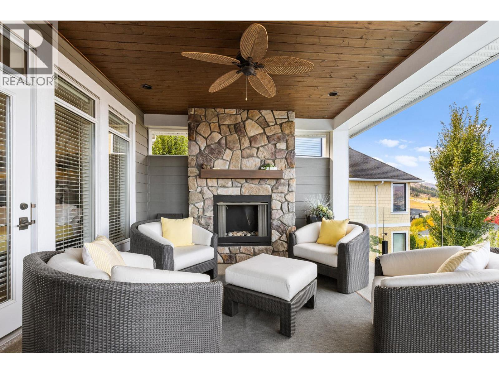 388 Rindle Court, Kelowna, BC - Outdoor With Fireplace With Deck Patio Veranda With Exterior