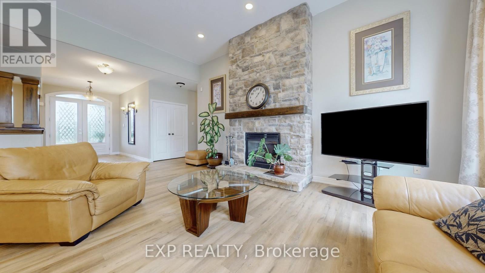 42 Somerville Crescent, Mulmur, ON - Indoor Photo Showing Living Room With Fireplace