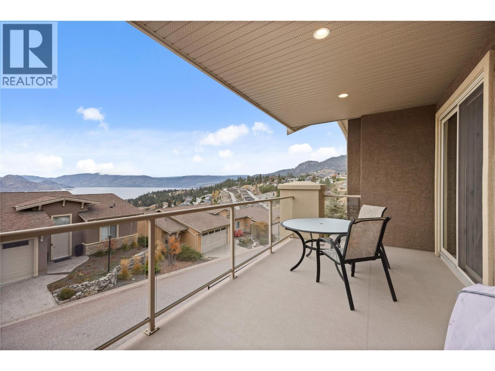 Spacious covered deck with lake views - 5165 Trepanier Bench Road Unit# 250, Peachland, BC - Outdoor With View With Exterior