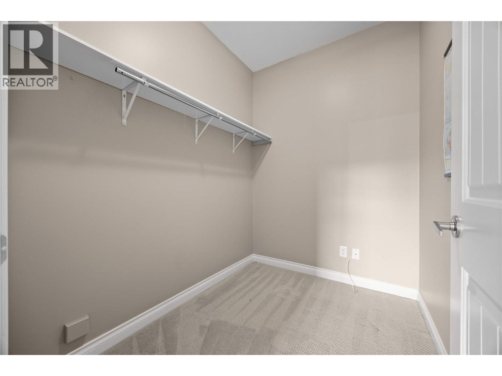Third bedroom - walk in closet - 5165 Trepanier Bench Road Unit# 250, Peachland, BC - Indoor With Storage