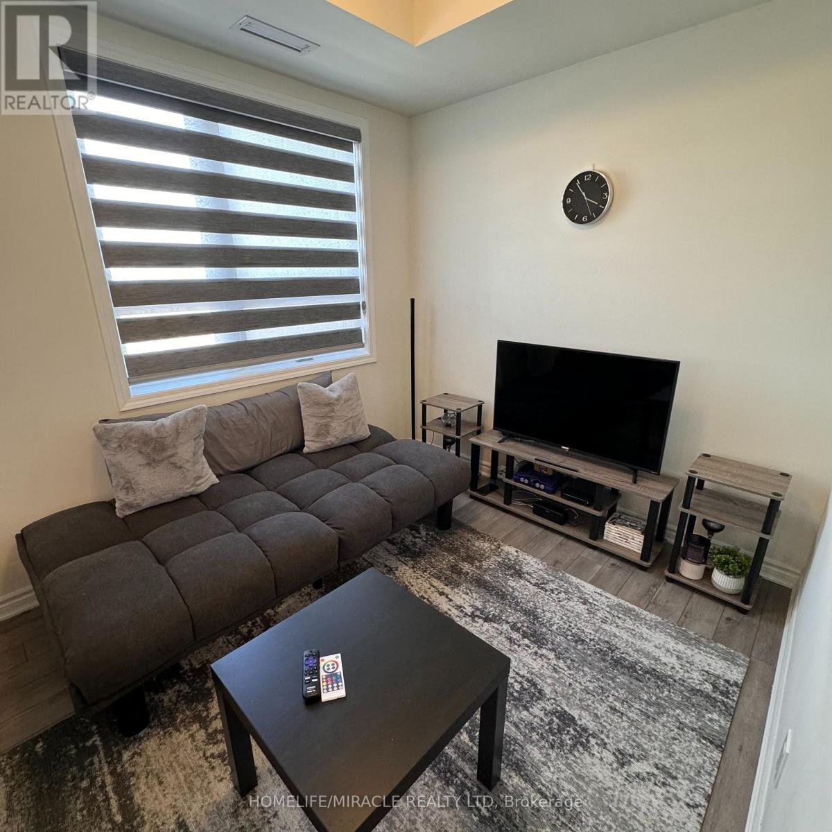 508 - 200 Lagerfeld Drive, Brampton, ON - Indoor Photo Showing Living Room