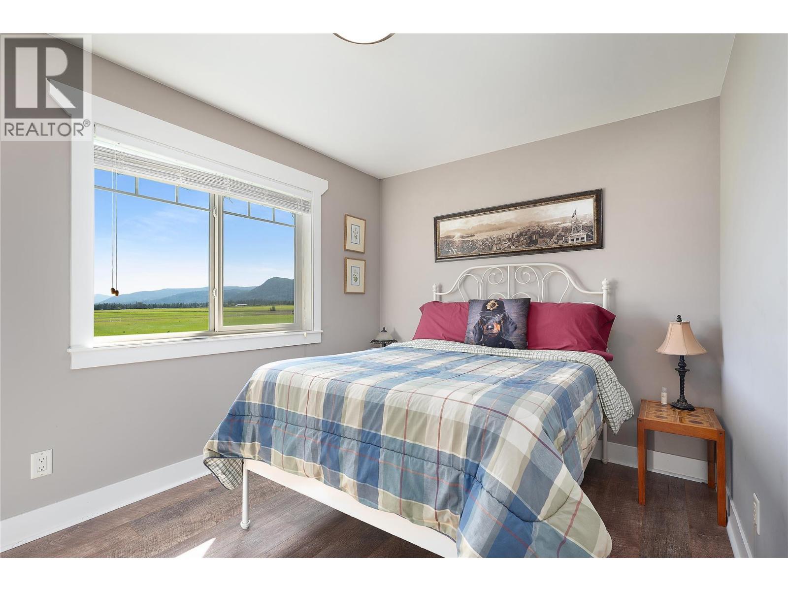 Upper Bed 3 - 4537 Lansdowne Road, Armstrong, BC - Indoor Photo Showing Bedroom