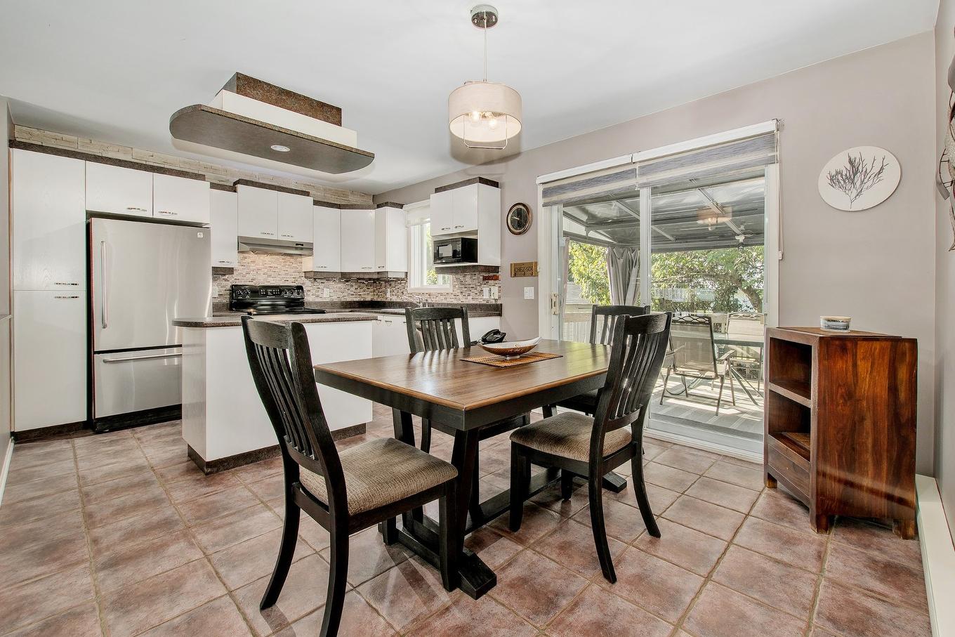 Salle à manger - 4220 Rue De Mauriac, Terrebonne (Terrebonne), QC - Indoor Photo Showing Dining Room