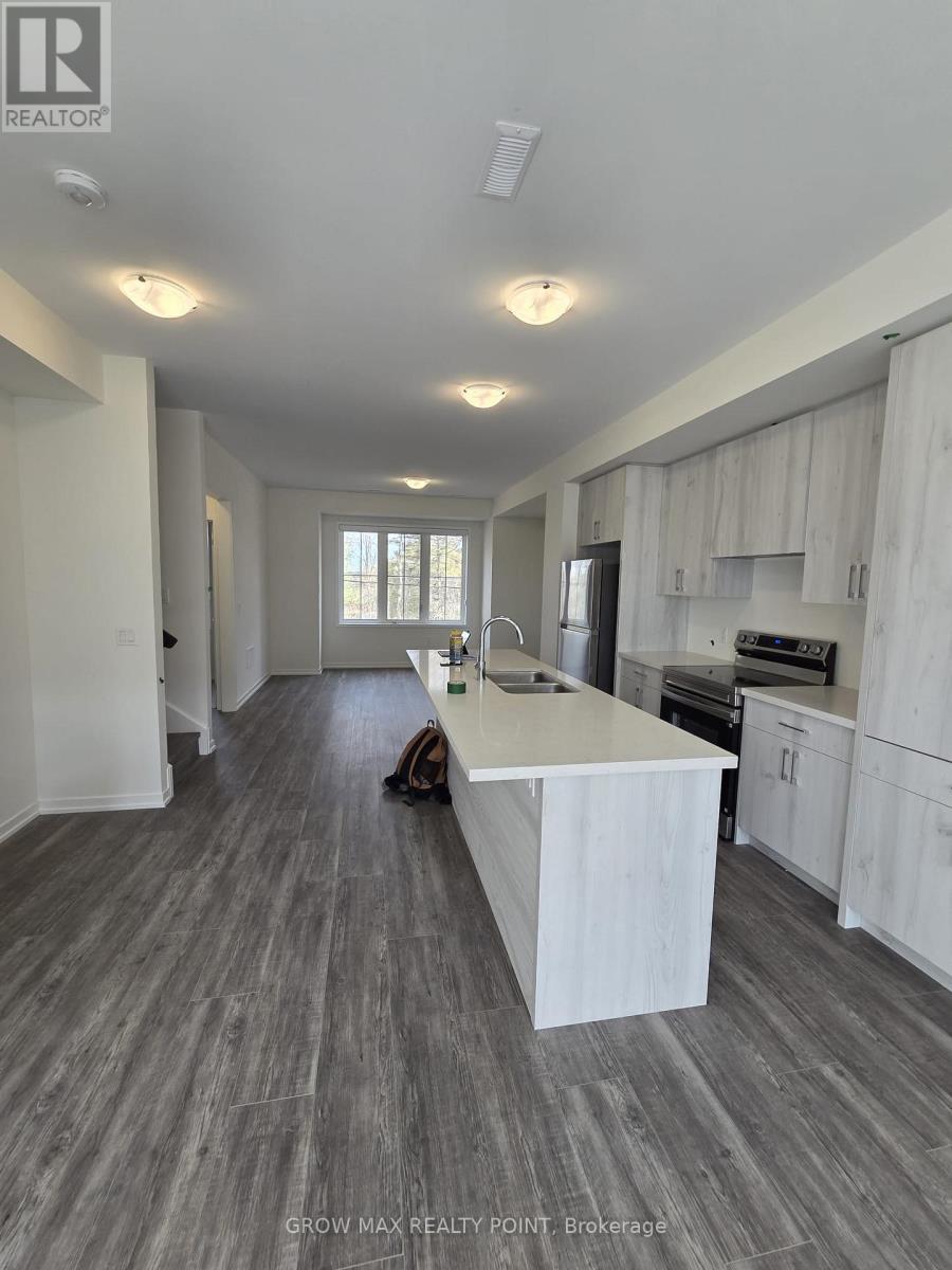 3 - 7 Kingbird Common, Cambridge, ON - Indoor Photo Showing Kitchen With Double Sink