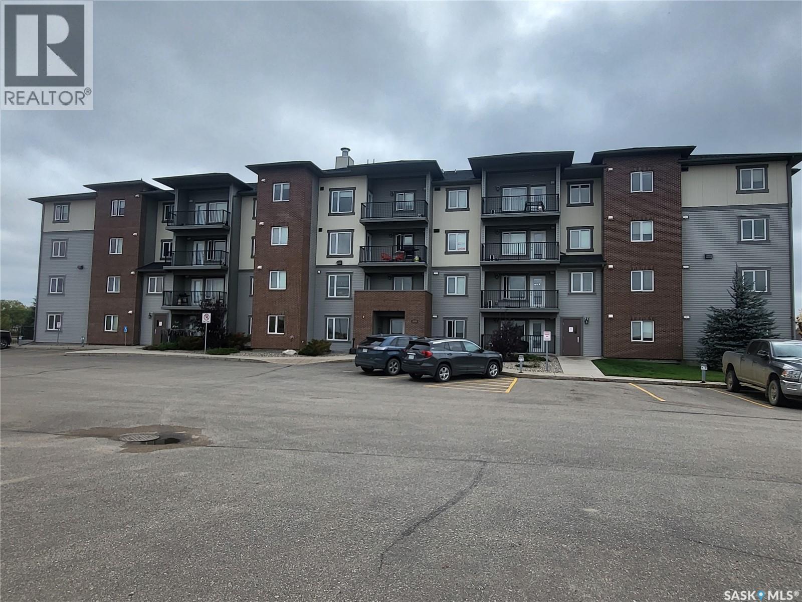 202 2141 Larter Road, Estevan, SK - Outdoor With Balcony With Facade