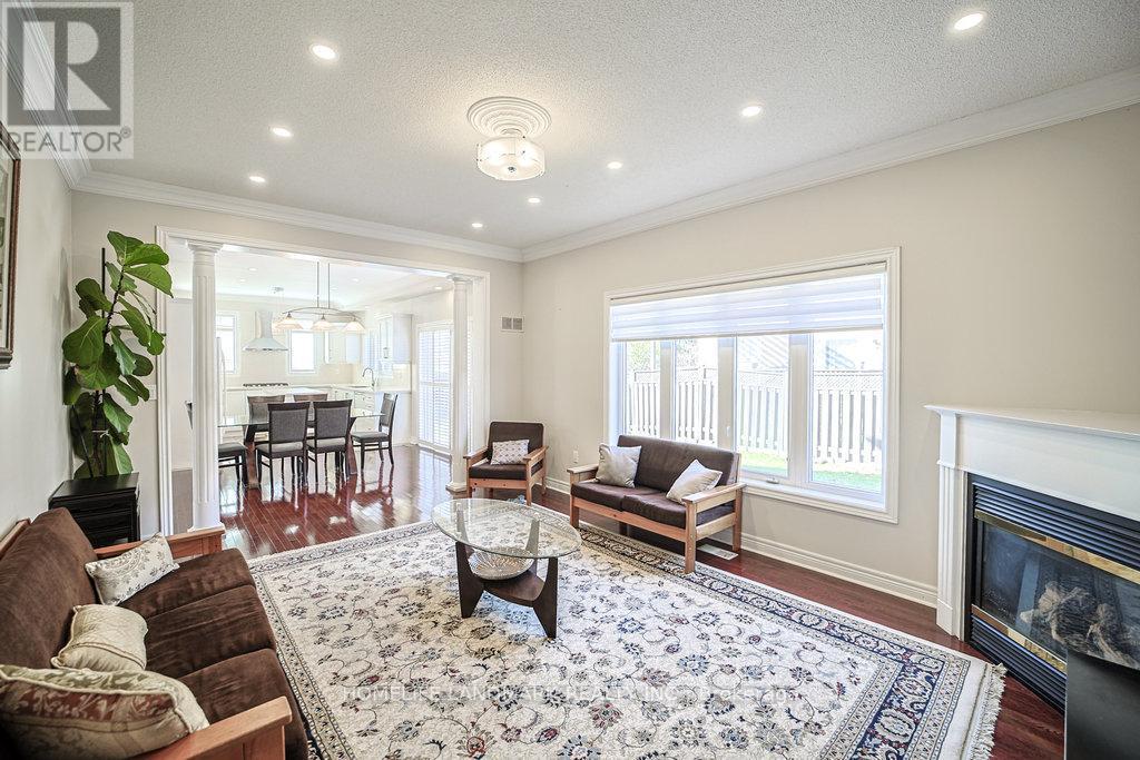 3565 Stonecutter Crescent, Mississauga, ON - Indoor Photo Showing Living Room With Fireplace