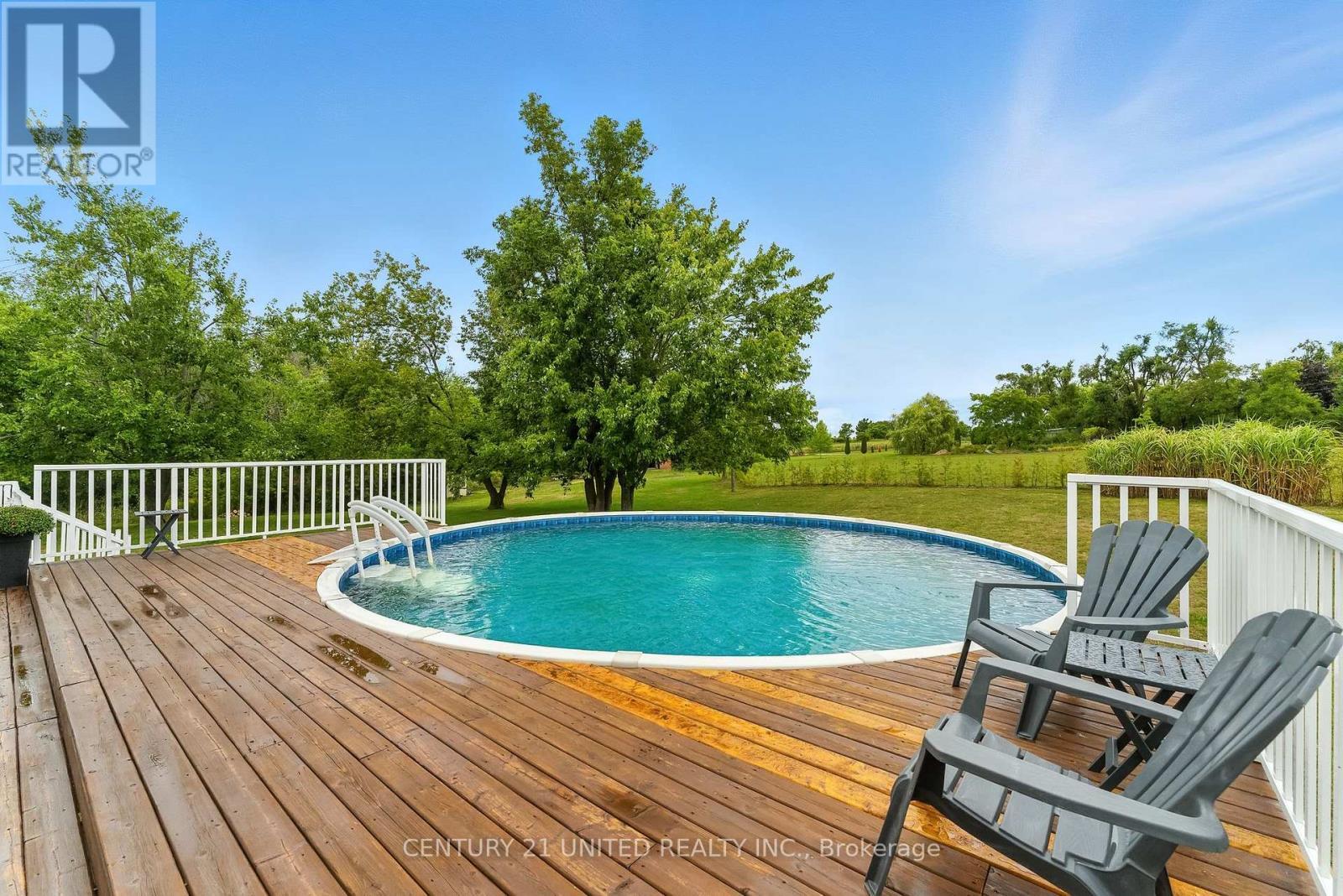 2038 Hilliard Street, Selwyn, ON - Outdoor With Above Ground Pool With Deck Patio Veranda With Backyard