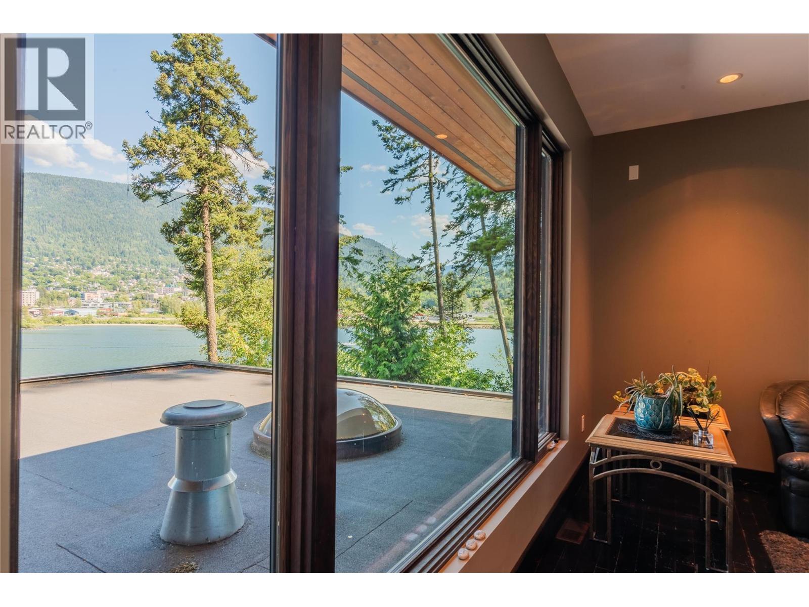 59 Johnstone Road, Nelson, BC - Photo Showing Other Room With Body Of Water