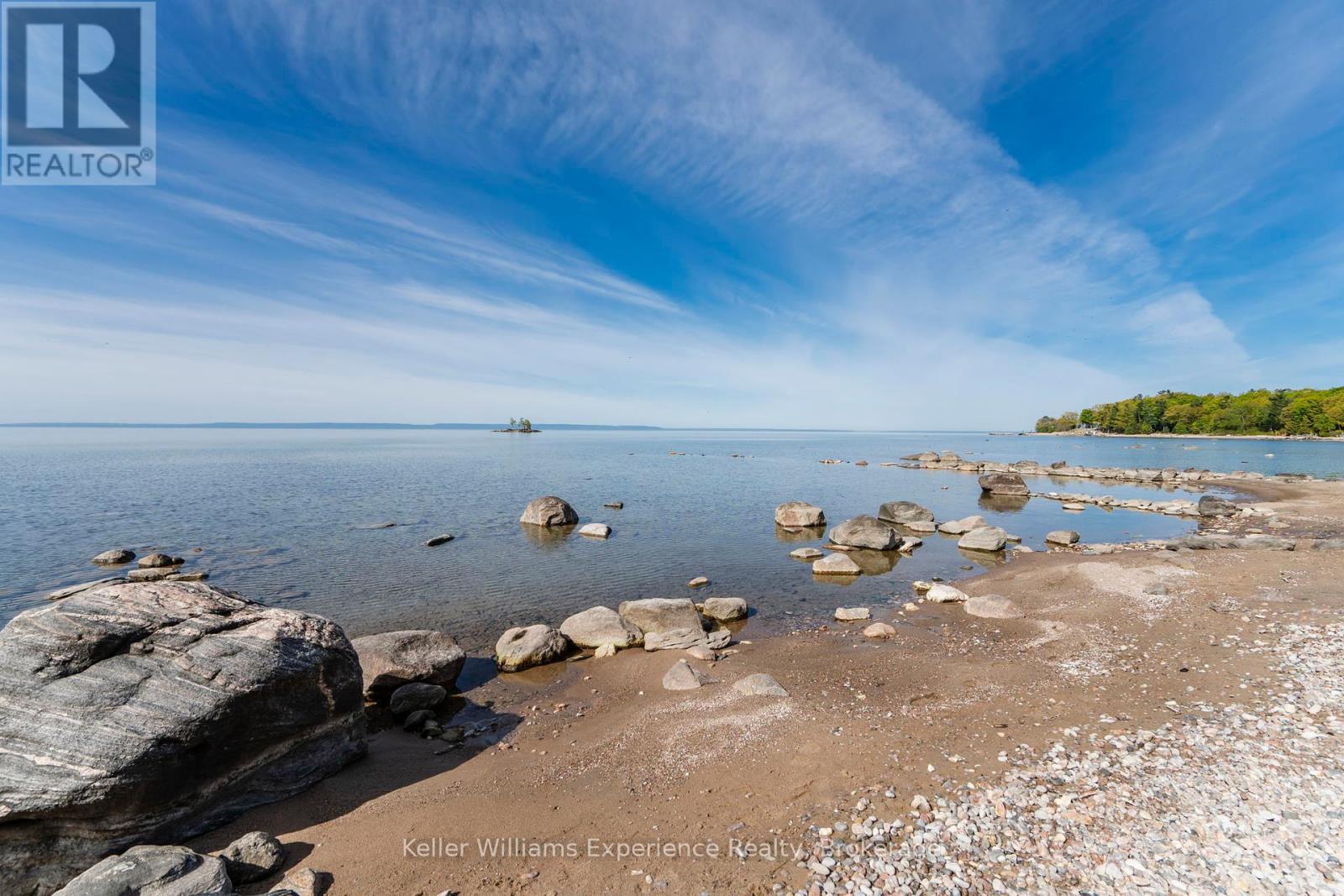 70 Wahnekewening Drive, Tiny, ON - Outdoor With Body Of Water With View