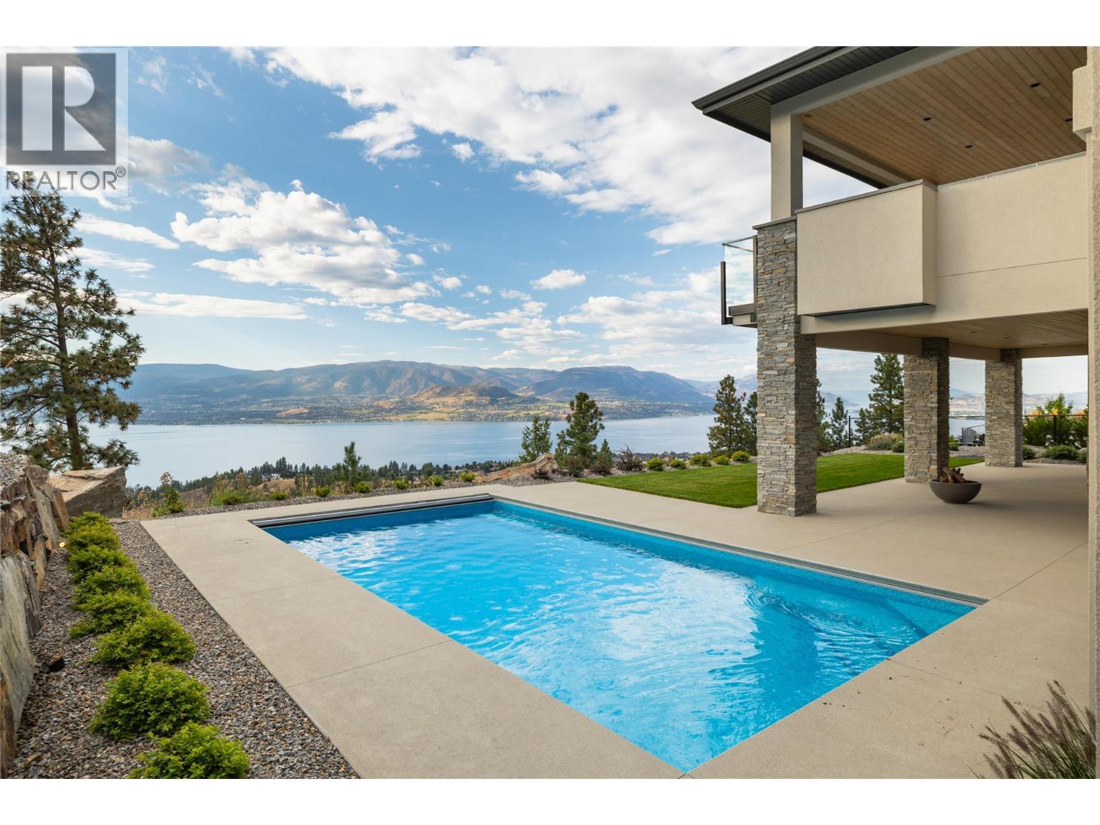 5650 The Edge Place Unit# 110, Kelowna, BC - Outdoor With In Ground Pool With Deck Patio Veranda With View
