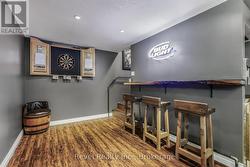 basement level dart and sitting area -