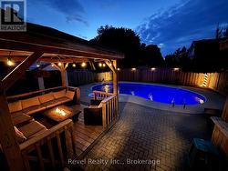 backyard pool oasis and lounge area -