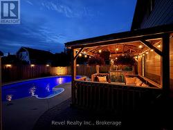 backyard pool oasis w lounge area -
