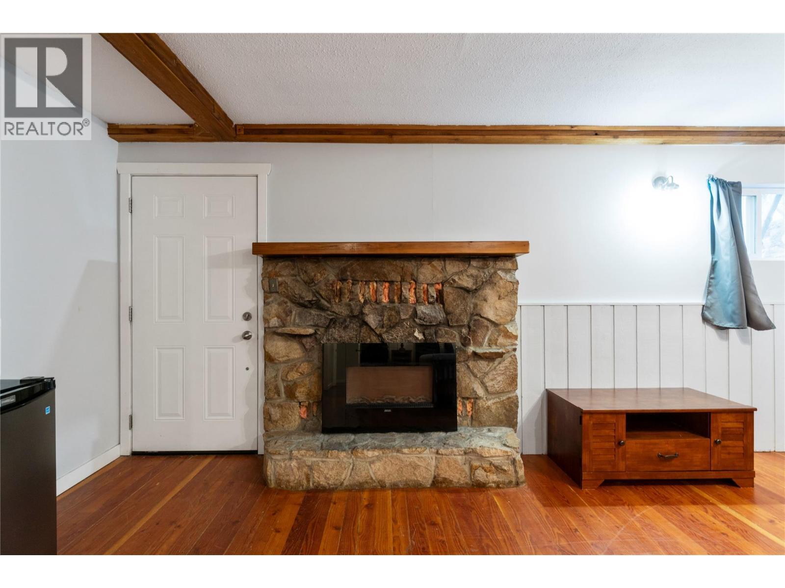5327 Squilax Anglemont Road, Celista, BC - Indoor Photo Showing Living Room With Fireplace