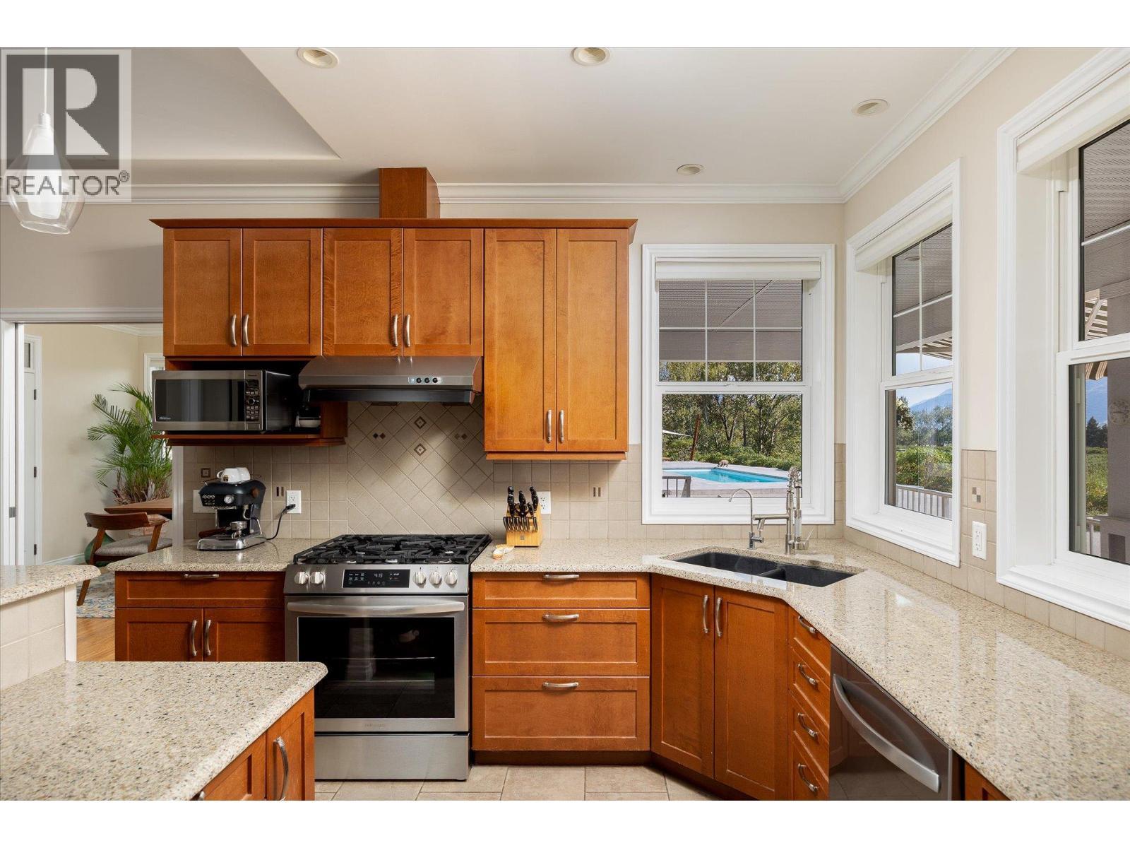 802 Coulthard Road, Cawston, BC - Indoor Photo Showing Kitchen With Double Sink