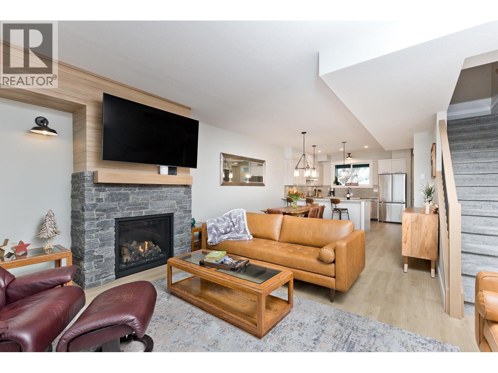 120 Grizzly Ridge Trail Unit# 12, Big White, BC - Indoor Photo Showing Living Room With Fireplace