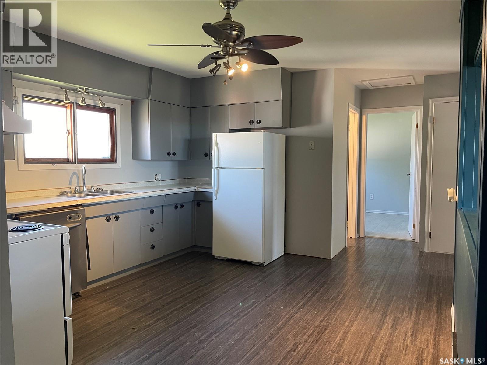 196 3Rd Street W, Pierceland, SK - Indoor Photo Showing Kitchen With Double Sink