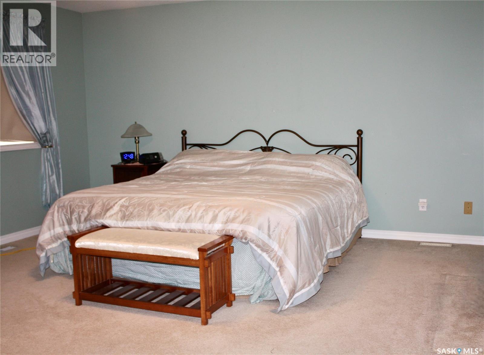 31 Queen Street, Clavet, SK - Indoor Photo Showing Bedroom