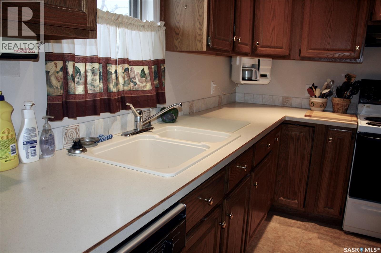 31 Queen Street, Clavet, SK - Indoor Photo Showing Kitchen With Double Sink