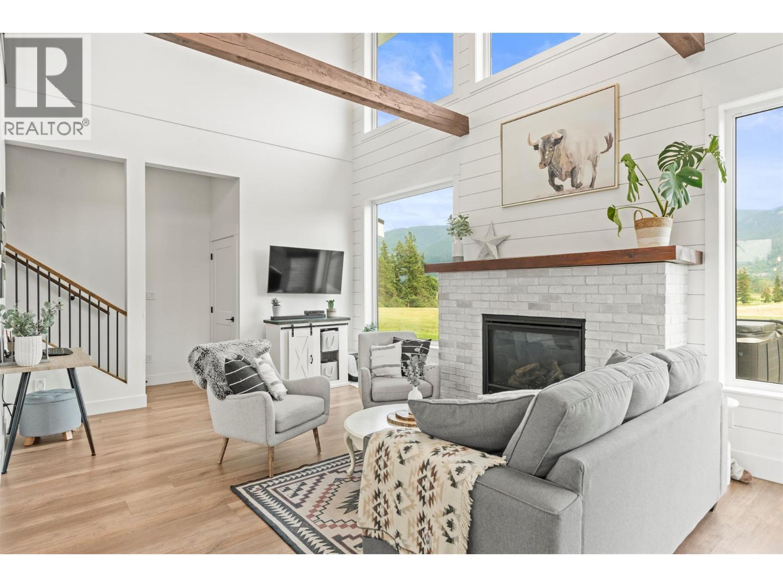 2589 Young Road, Spallumcheen, BC - Indoor Photo Showing Living Room With Fireplace