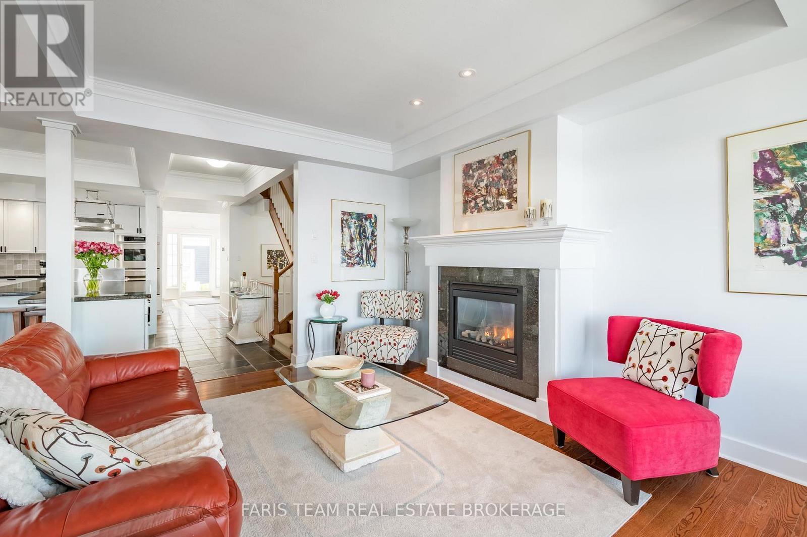 12 - 155 William Street, Midland, ON - Indoor Photo Showing Living Room With Fireplace