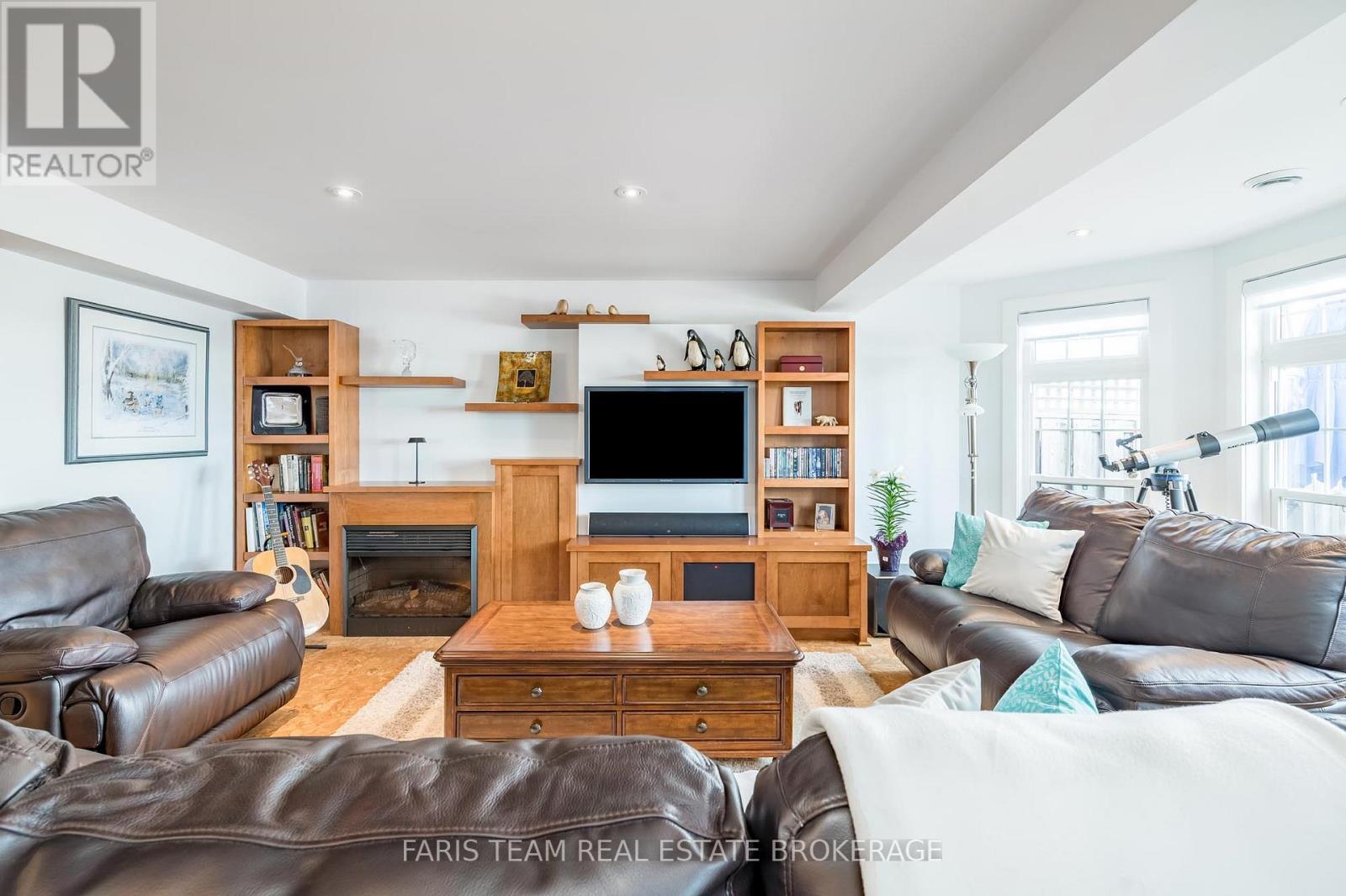 12 - 155 William Street, Midland, ON - Indoor Photo Showing Living Room With Fireplace