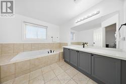 Quartz Counter, Soaker Tub -