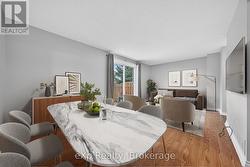 Virtually Staged Living/Dining Combo - View 1 -