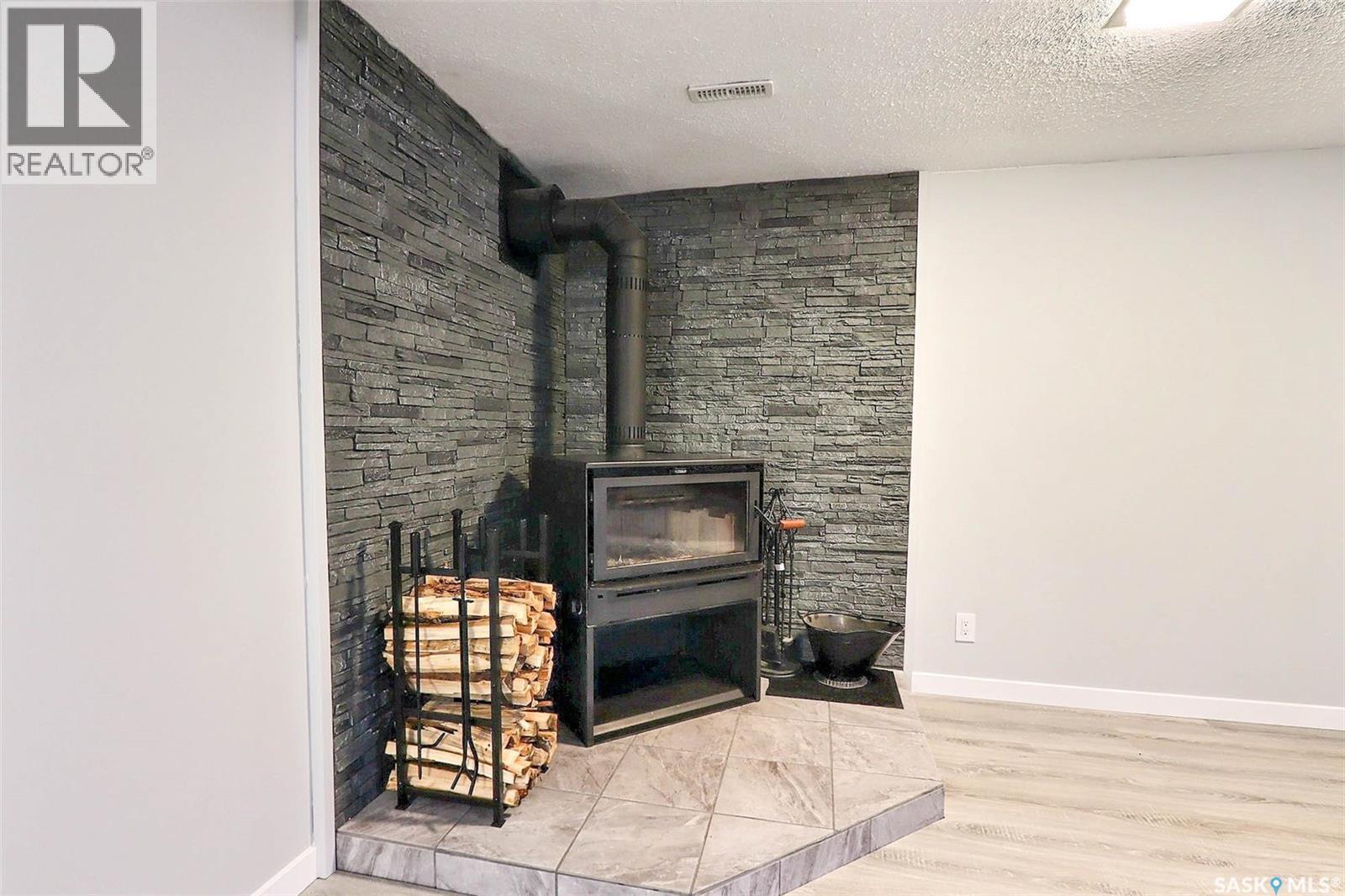 199 Macdowall Crescent, Prince Albert, SK - Indoor With Fireplace
