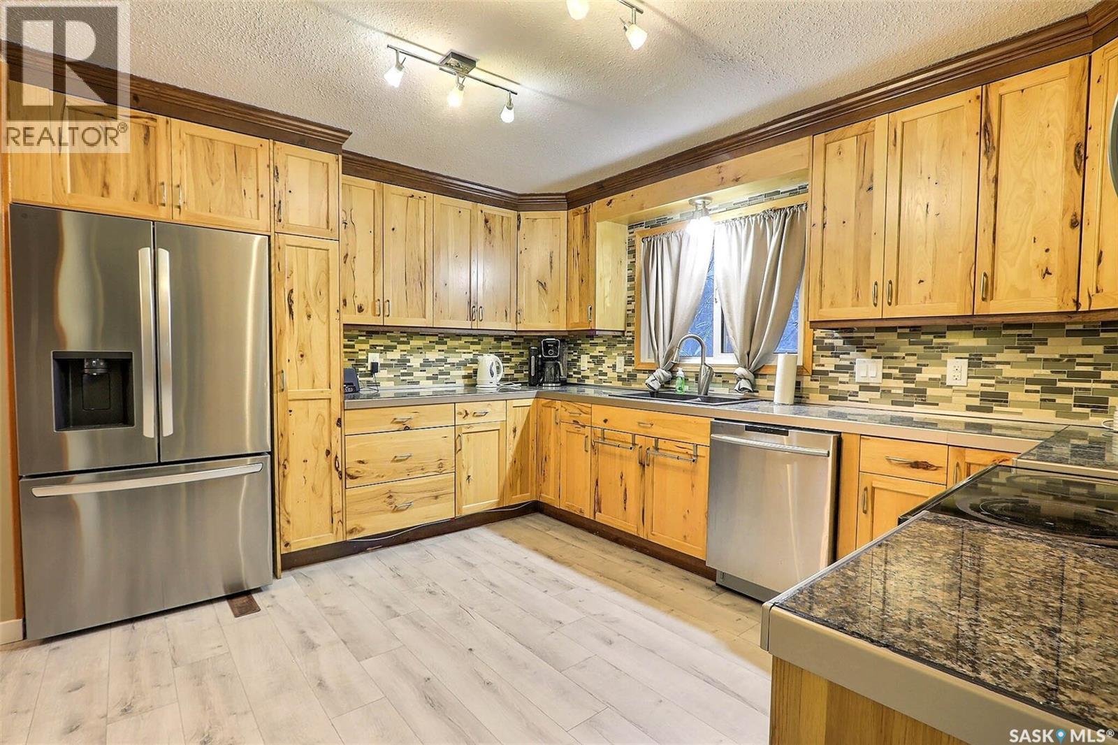 199 Macdowall Crescent, Prince Albert, SK - Indoor Photo Showing Kitchen With Double Sink