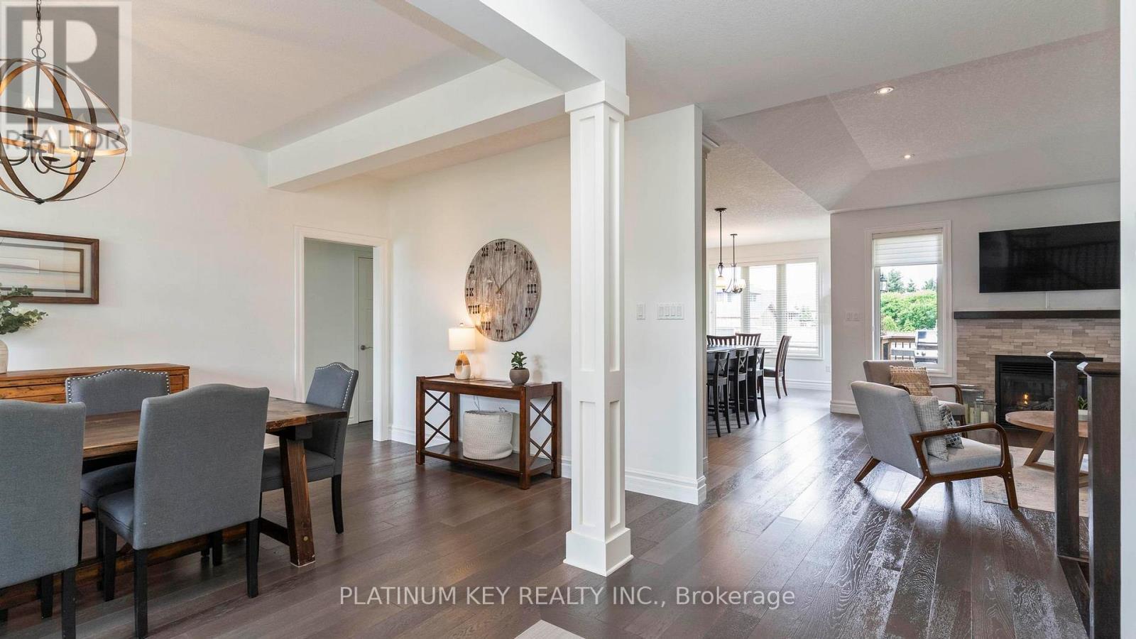 688 Woods Edge Road, Strathroy-Caradoc (Mount Brydges), ON - Indoor Photo Showing Dining Room With Fireplace
