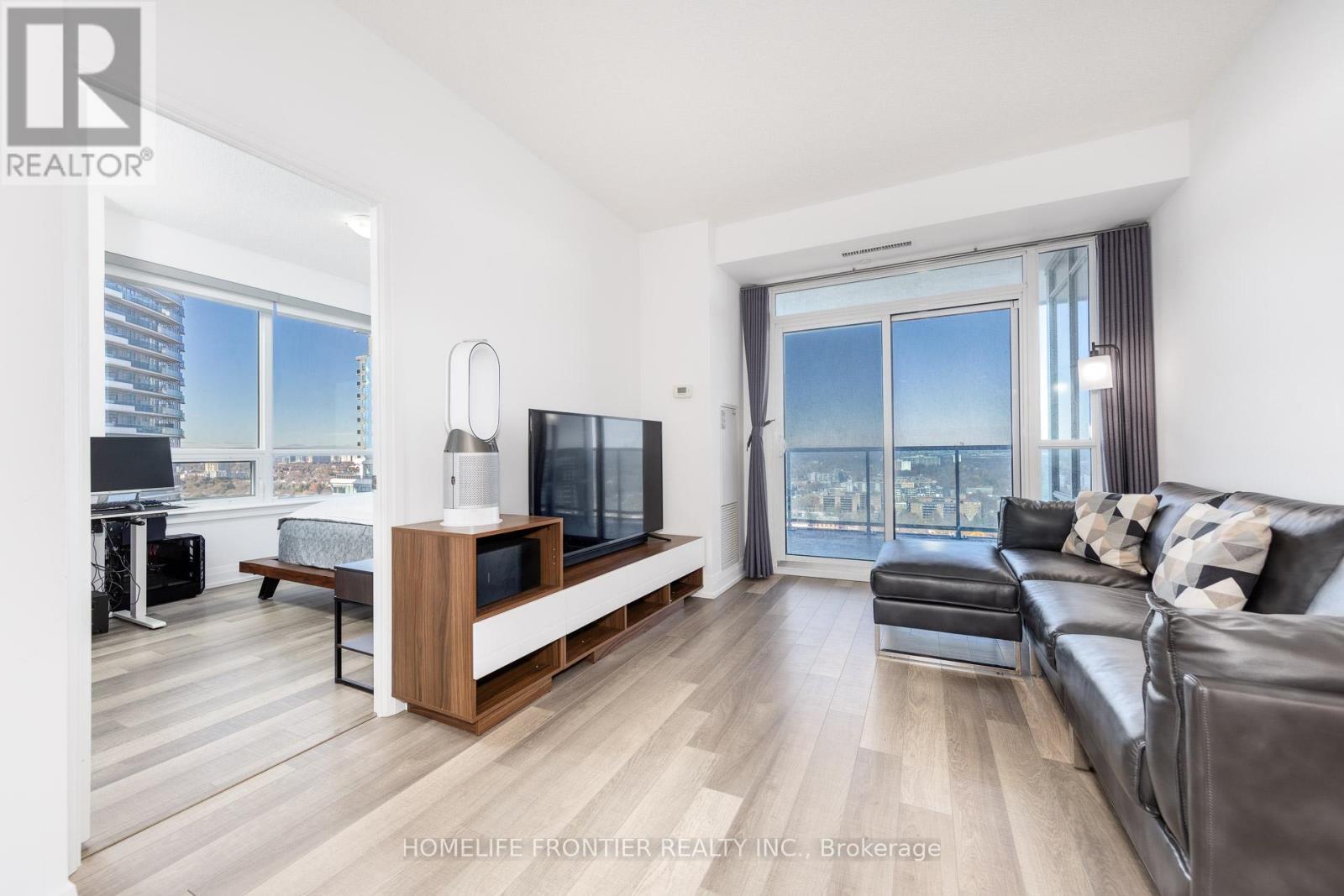 Ph209 - 7167 Yonge Street, Markham, ON - Indoor Photo Showing Living Room