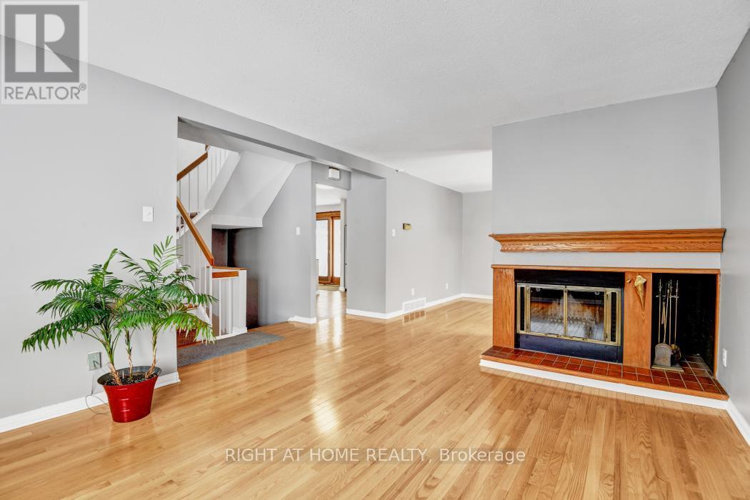 living room - 52 Ventnor Way, Ottawa, ON - Indoor Photo Showing Living Room With Fireplace