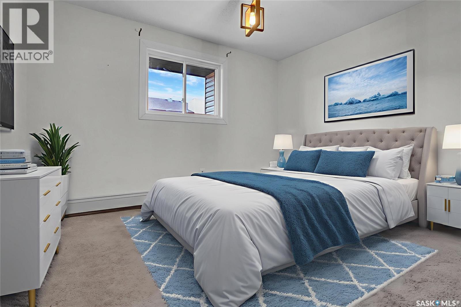 205 51 Wood Lily Drive, Moose Jaw, SK - Indoor Photo Showing Bedroom