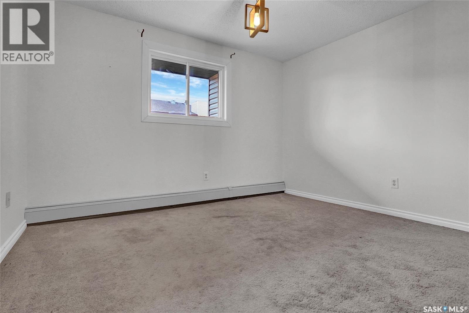 205 51 Wood Lily Drive, Moose Jaw, SK - Indoor Photo Showing Other Room