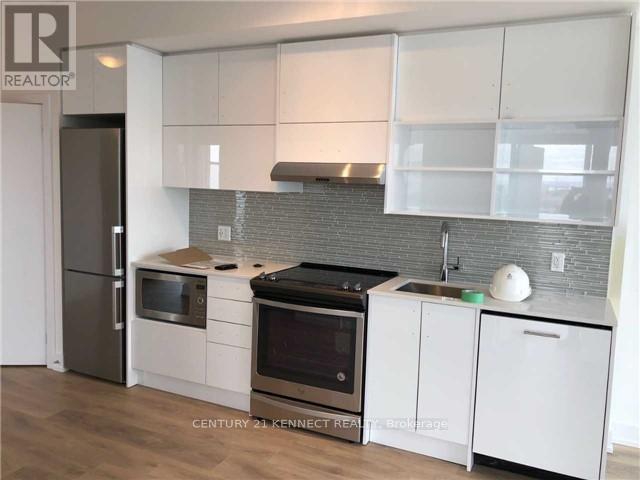 1205 - 128 Fairview Mall Drive, Toronto, ON - Indoor Photo Showing Kitchen With Upgraded Kitchen