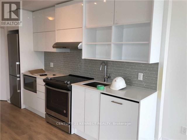 1205 - 128 Fairview Mall Drive, Toronto, ON - Indoor Photo Showing Kitchen With Upgraded Kitchen