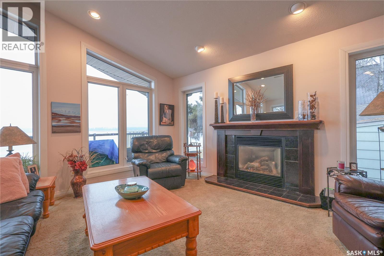 318 Neis Drive, Lakeland Rm No. 521, SK - Indoor Photo Showing Living Room With Fireplace
