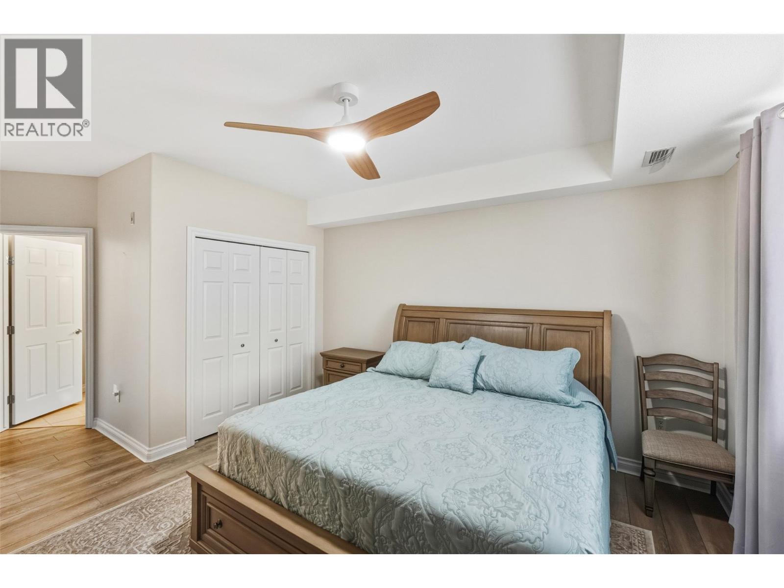 primary bedroom - 921 Spillway Road Unit# 102B, Oliver, BC - Indoor Photo Showing Bedroom