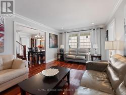 There is plenty of seating in this living room. -